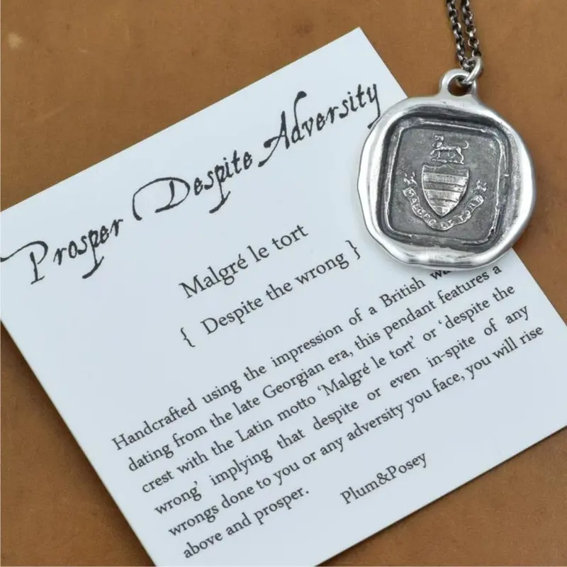 Prosperity Symbol Pendant – Uplifting Gold-Tone Design 1