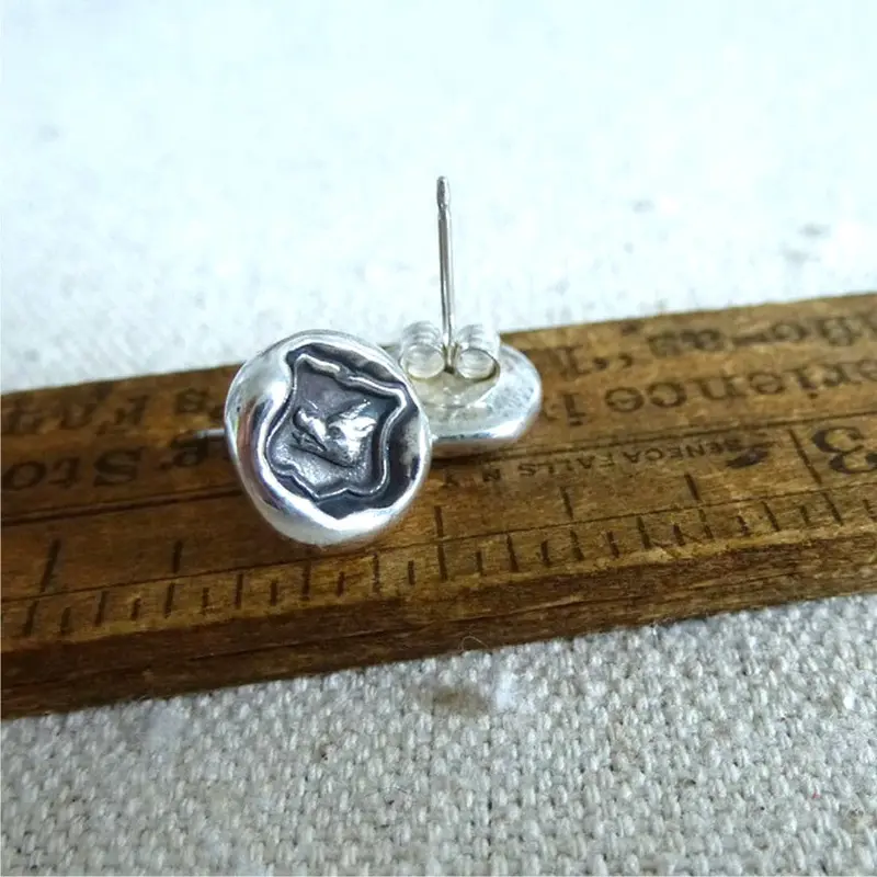 Warrior-Themed Dangle Earrings 1