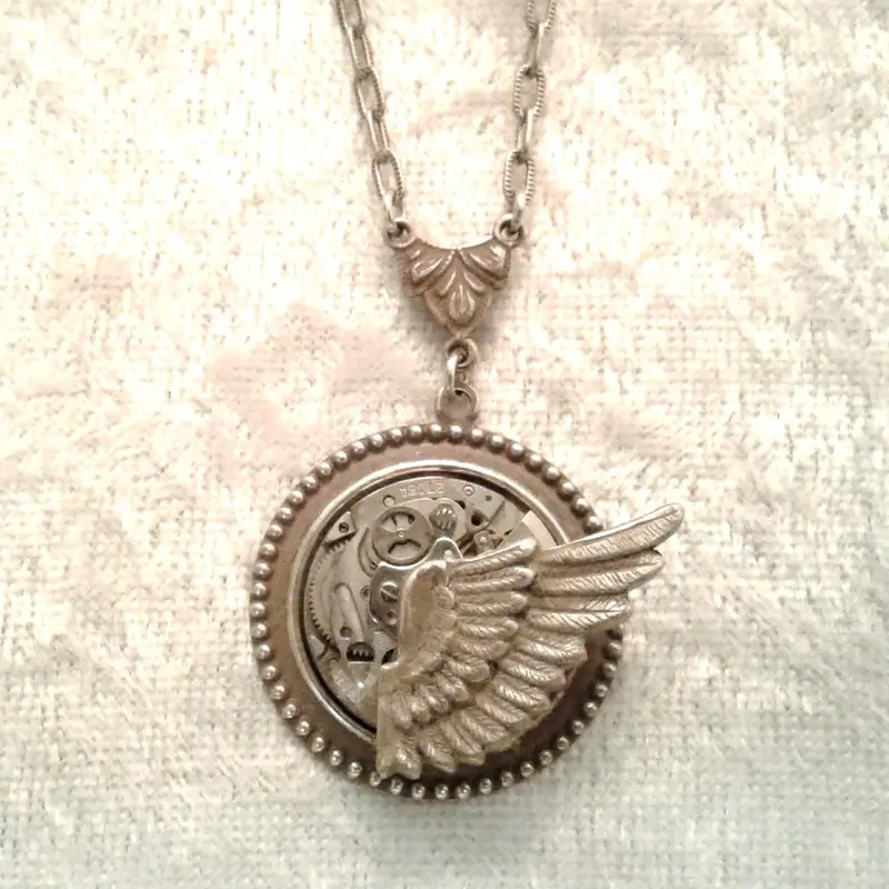 Wing-Inspired Rocking Motion Pendant 1